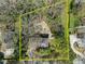 Birds eye view of home with yellow boundary highlighting the property line and driveway at 2386 Bohler Nw Rd, Atlanta, GA 30327