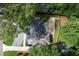 Aerial view of home showcasing the roof, backyard, patio, and surrounding greenery at 2676 Cottonwood Dr, Marietta, GA 30066