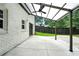 Back patio with a concrete floor, covering and view of the grassy yard at 2676 Cottonwood Dr, Marietta, GA 30066