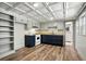 Basement kitchen with modern appliances, ample cabinet space, and durable laminate flooring at 2676 Cottonwood Dr, Marietta, GA 30066