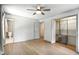 Open bedroom featuring hardwood floors, a closet, and an ensuite bathroom at 2676 Cottonwood Dr, Marietta, GA 30066