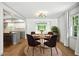 Cozy dining area connecting the modern kitchen and living spaces at 2676 Cottonwood Dr, Marietta, GA 30066