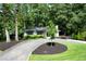 Charming front exterior featuring a well-manicured lawn and brick accents at 2676 Cottonwood Dr, Marietta, GA 30066
