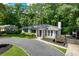 Charming front exterior featuring a well-manicured lawn and brick accents at 2676 Cottonwood Dr, Marietta, GA 30066