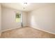Cozy bedroom with neutral walls, carpet, and window to let in the light at 3645 Shrewsbury Ct, Snellville, GA 30039