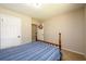 Guest bedroom with double bed, carpet flooring, and ample natural light at 3645 Shrewsbury Ct, Snellville, GA 30039