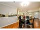 Open-concept dining area flowing into the living room and kitchen, perfect for entertaining at 3645 Shrewsbury Ct, Snellville, GA 30039