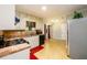 Well-lit kitchen featuring white cabinetry, ample counter space, and stainless steel appliances at 3645 Shrewsbury Ct, Snellville, GA 30039