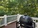 Backyard deck with a Primo ceramic grill, perfect for outdoor cooking and entertaining at 377 Camden Ne Rd, Atlanta, GA 30309