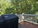Backyard deck with a Weber grill, perfect for outdoor cooking and entertaining at 377 Camden Ne Rd, Atlanta, GA 30309