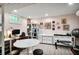 Finished basement with home office, gym area, and neutral flooring at 377 Camden Ne Rd, Atlanta, GA 30309