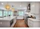 Bright kitchen features a large island, granite countertops, and stainless steel appliances at 377 Camden Ne Rd, Atlanta, GA 30309