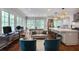 Open-concept kitchen seamlessly blends with a cozy living area, perfect for modern living at 377 Camden Ne Rd, Atlanta, GA 30309