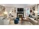 Cozy living room featuring a fireplace, comfortable seating, and stylish decor at 377 Camden Ne Rd, Atlanta, GA 30309