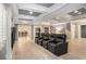 Finished basement space featuring theater seating and views to wet bar and kitchen at 1155 Admiral Xing, Alpharetta, GA 30005
