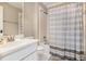 Well-maintained bathroom with a combined shower and tub and updated fixtures at 1155 Admiral Xing, Alpharetta, GA 30005