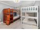This bright bedroom offers a bunk bed and twin bed, perfect for the  at 1155 Admiral Xing, Alpharetta, GA 30005