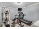 Home gym featuring workout machines and a mounted television at 1155 Admiral Xing, Alpharetta, GA 30005