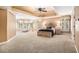 Relax in this grand primary suite, featuring an oversized bedroom, plush carpet, and soft neutral tones at 1155 Admiral Xing, Alpharetta, GA 30005