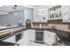 Basement wet bar featuring beverage refrigerator, modern cabinets and countertops at 1155 Admiral Xing, Alpharetta, GA 30005
