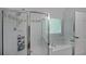 Bright bathroom with a glass door shower and adjacent tub at 4321 Clairesbrook Ln, Acworth, GA 30101