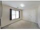 Spacious and bare bedroom with neutral walls and floors, offering versatility and a blank canvas at 4321 Clairesbrook Ln, Acworth, GA 30101