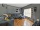 Cozy living room with comfortable seating, hardwood floors, and bright natural light at 4321 Clairesbrook Ln, Acworth, GA 30101