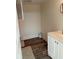 Bathroom with wood-look flooring and a white vanity at 4325 Dawning Ln, Douglasville, GA 30135