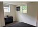 This simple bedroom has natural light from two windows at 4325 Dawning Ln, Douglasville, GA 30135
