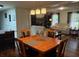 Dining area leads to living room with hardwood floors and a view to the backyard at 4325 Dawning Ln, Douglasville, GA 30135