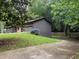 Ranch style home with a large garage and mature trees at 4325 Dawning Ln, Douglasville, GA 30135