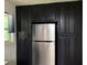 The modern kitchen features new refrigerator and lots of cabinet space at 4325 Dawning Ln, Douglasville, GA 30135
