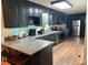 View of kitchen shows stainless steel appliances and granite countertops at 4325 Dawning Ln, Douglasville, GA 30135
