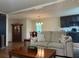 Cozy living room features neutral paint, plush couch, and a rustic coffee table at 4325 Dawning Ln, Douglasville, GA 30135