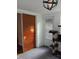 The room has a modern sliding wooden door and white brick wall, and access to the outside at 4325 Dawning Ln, Douglasville, GA 30135