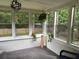 Sunroom view shows the natural light and the spacious feel of the home at 4325 Dawning Ln, Douglasville, GA 30135