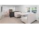 Spacious living room area with built-in dining nook and lots of natural light at 5070 Hensley Dr, Atlanta, GA 30338