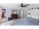 Spacious main bedroom with light blue walls, a walk-in closet, and an ensuite bathroom at 5070 Hensley Dr, Atlanta, GA 30338