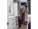 Organized walk-in closet maximizes space with custom shelves, drawers and hanging storage at 5070 Hensley Dr, Atlanta, GA 30338