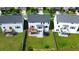 Aerial view of the backyard featuring a wooden deck with an umbrella and a trampoline at 1820 Primrose Park Rd, Sugar Hill, GA 30518