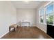 Bright and airy flex room with hardwood floors, lots of natural light and a piano at 1820 Primrose Park Rd, Sugar Hill, GA 30518