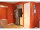 Kitchen featuring stainless steel refrigerator, tile floors, and access to additional rooms at 3255 Hunters Crossing Pt, Lithonia, GA 30038