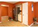 Kitchen featuring stainless steel refrigerator and adjacent pantry space at 3255 Hunters Crossing Pt, Lithonia, GA 30038