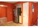 Kitchen featuring stainless steel refrigerator and adjacent pantry space at 3255 Hunters Crossing Pt, Lithonia, GA 30038