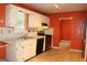 Bright kitchen featuring white cabinetry, stainless steel appliances, and tile flooring at 3255 Hunters Crossing Pt, Lithonia, GA 30038