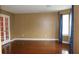 Spacious living room with hardwood floors, natural light, and neutral paint at 3255 Hunters Crossing Pt, Lithonia, GA 30038