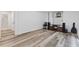 Wide view of the finished basement highlighting stylish floors and providing ample living space at 3541 Wilton Ave, Atlanta, GA 30340