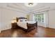 Spacious bedroom features tray ceilings, hardwood floors, and a large window at 3541 Wilton Ave, Atlanta, GA 30340