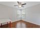 Bright bedroom with hardwood floors, a ceiling fan, and natural light at 3541 Wilton Ave, Atlanta, GA 30340