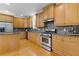 Modern kitchen with granite countertops, stainless steel appliances, and ample cabinet space, creating a chef-friendly environment at 3541 Wilton Ave, Atlanta, GA 30340